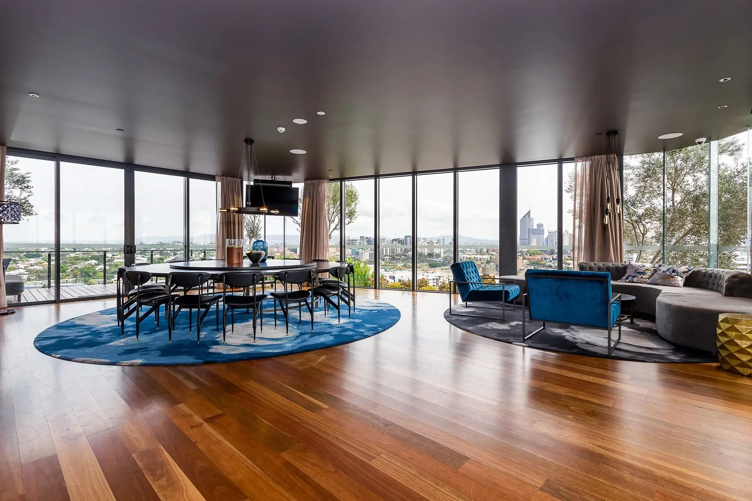 Open dining and living area with city views