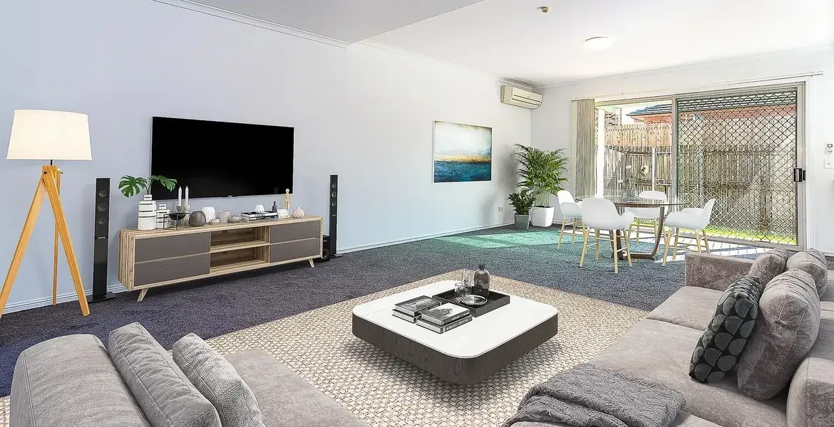 Empty living room shown with virtual furniture