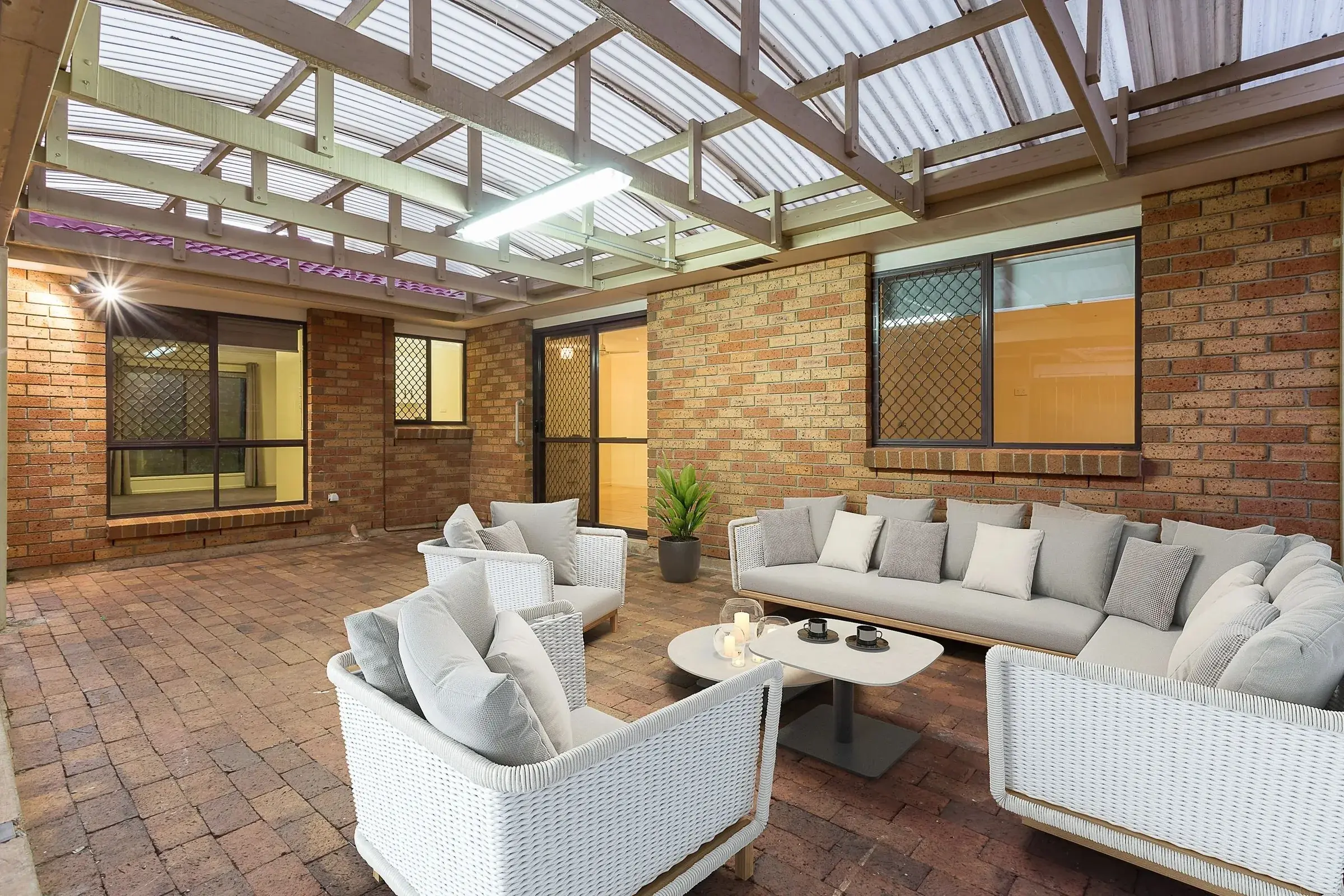 Covered patio furnished with virtual outdoor lounges